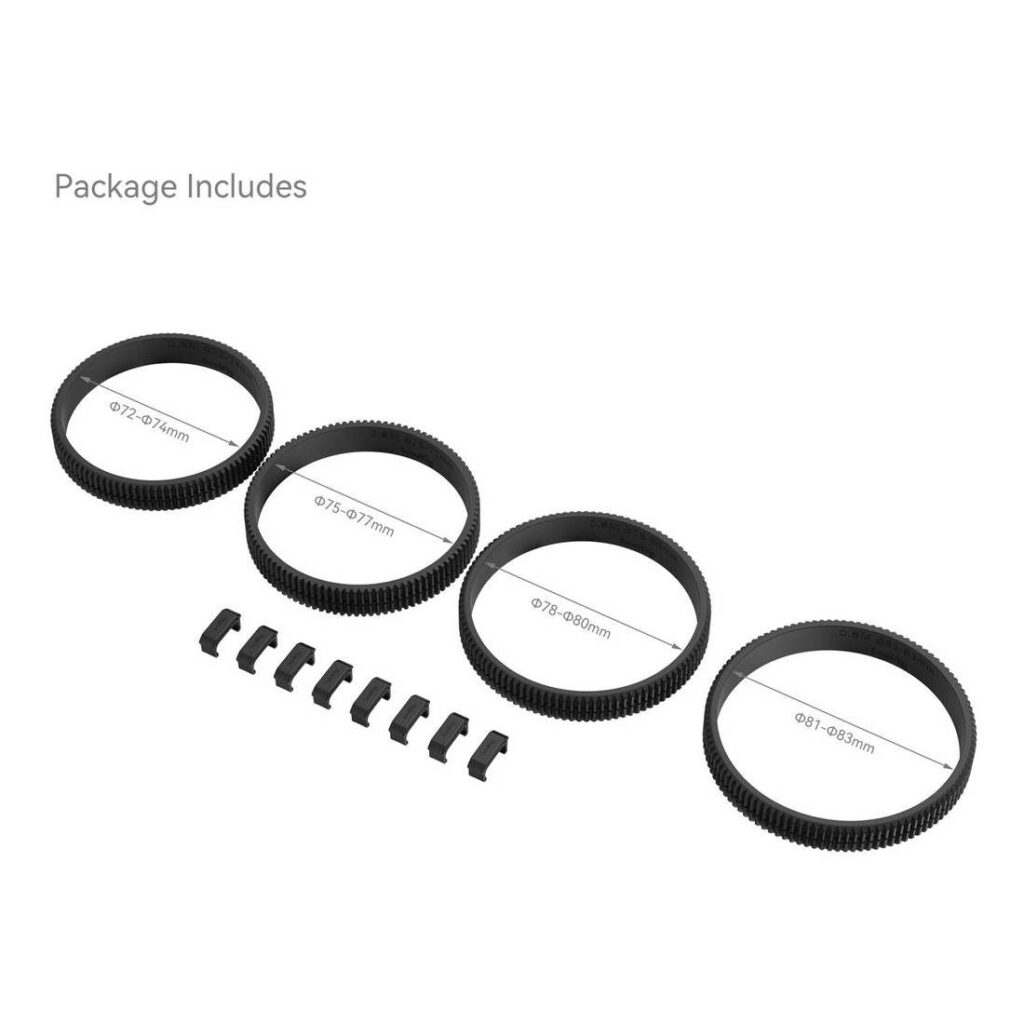 1694608678_917 SmallRig 4187 Saumaton Focus Gear Ring Kit (72-74mm, 75-77mm, 78-80mm, 81-83mm) sisältää neljä erikokoista mustaa hammasrengasta ja kahdeksan liitintä, jotka kaikki näkyvät valkoisella pohjalla tekstillä "Package Includes.