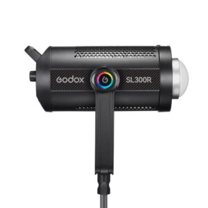 1698323067_169 Godox SL300R RGB LED -videovalaisin -LED-valo näkyy sivulta mustana, ja siinä on värikäs virtapainike, kiinnityskannatin ja hopeanvärinen kupolimuotoinen etukansi.