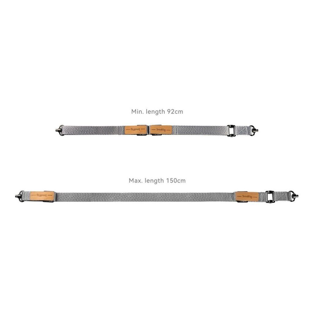 1698674748_882 SmallRig 4118B Painoa vähentävä olkahihna DJI RS 3/RS 3 Pro/RS 2/RSC 2 -laitteille on esitetty kahdella säädettävällä harmaalla hihnalla, joissa molemmissa on ruskeat nahkatunnisteet, mustat lukot ja pituusalue 92 cm - 150 cm.