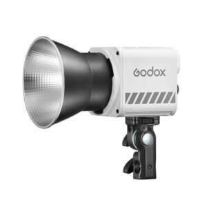 Godox ML60II BI Bi-Color LED-valaisin on kuvassa hopeisella heijastimella, joka on asennettu säädettävään mustaan jalustaan valkoista taustaa vasten.