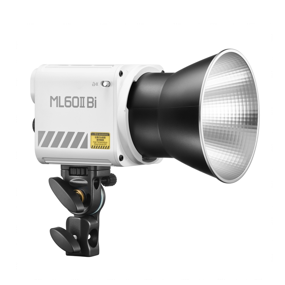 1703071070_876 Godox ML60II BI LED light Bi-Color LED light is shown with a large silver reflector and mounting bracket on a plain white background.