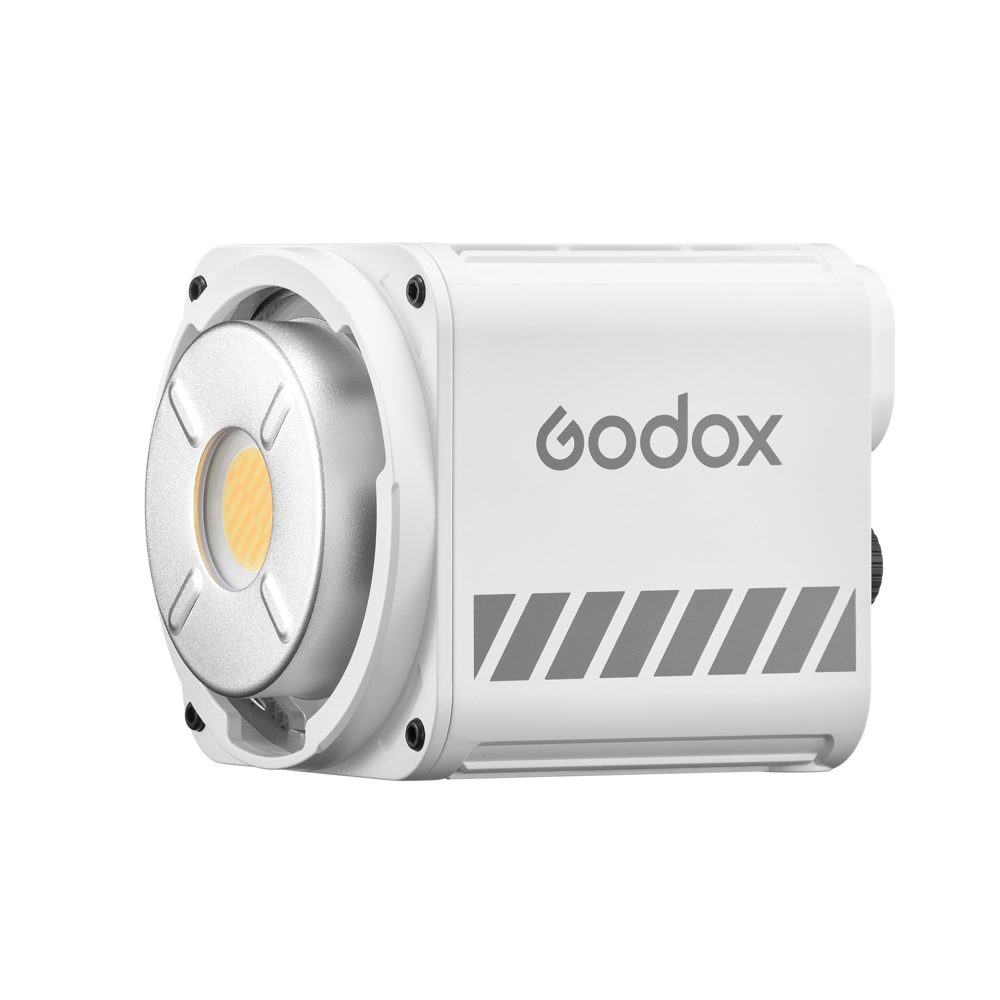 1703071071_538 The compact, white Godox ML60II BI Bi-Color LED luminaire with round LED front panel and grey side brand against a white background.