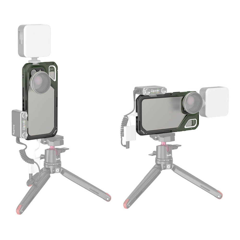 1704383878_614 Kaksi SmallRig 4473 x Brandon Li -mobiilivideohäkkiä iPhone 15 Pro Max -puhelimelle on asennettu ministatiiviin objektiivien, mikrofonien ja valojen kanssa. Vasen häkki on hieman haalistunut; oikea häkki on näkyvä ja täysin näkyvä.