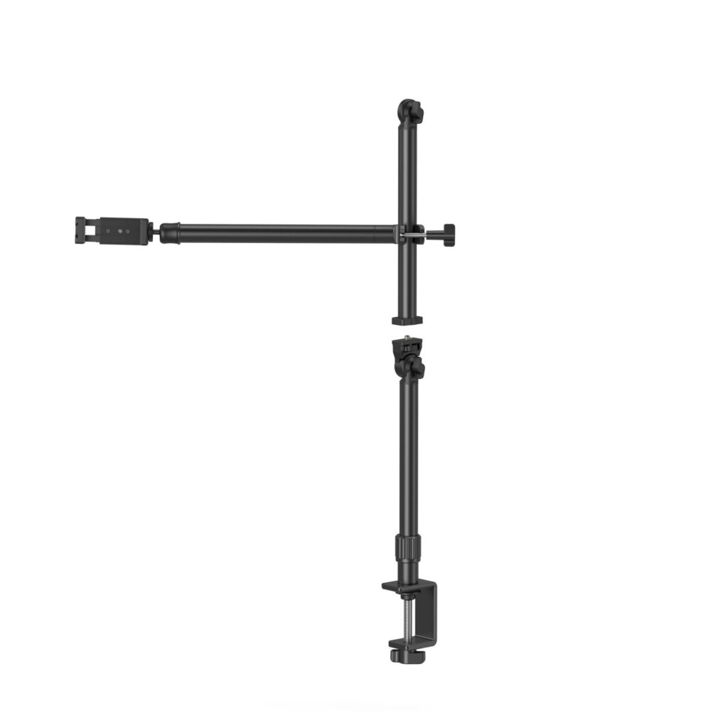 1706284728_962 SmallRig 4456 Live Desktop Camera Bracket DT 50 on musta, säädettävä metallivarsi, jossa on useita niveliä ja kiinnittimiä pöydän tai pöydän reunan kiinnittämistä varten, kuvassa valkoista taustaa vasten.
