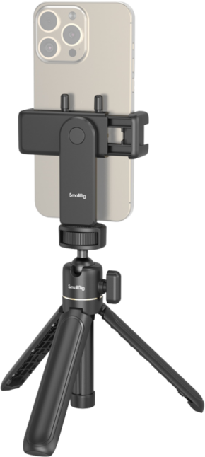 800q-01_127429 Älypuhelin asennettuna mustaan SmallRig 4364 Smartphone Vlog Tripod Kit VK-20 Advanced Version -jalustaan, jossa on säädettävät jalat ja puhelimen pidikkeen kiinnike, kuvattuna vaaleaa taustaa vasten.