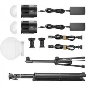 godox-lc30d-k2-litemons-tabletop-led-2-light-kit The Godox Litemons LED LC30Bi Tabletop Bi-color Light Double Light Kit includes two LED lights with power adapters, light diffusers, mounting adapters, connecting cables and a foldable tripod stand, all displayed on a white background.