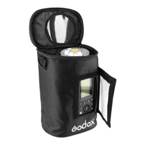 1560261306_677 The black Godox PB-600P Portable Bag for AD600Pro has zippered openings at the top and sides, revealing a circular LED light and control panel. The Godox logo appears on the front of the bag.