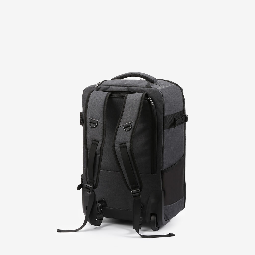 1586870957_100 Godox CB-17 Carry Roller Bag AD1200 Pro, dark grey with black accents, standing upright on a white base. It features padded backpack straps, top handle, side handles and wheels for easy transport.
