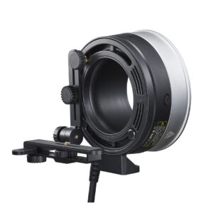1620046434_666 Godox FLB-90 Quick Rotating Camera Bracket Kit for R1200 -valokuvakameran kiinnityssarjassa on säätöpainikkeet, suuri pyöreä aukko ja liitetty virtajohto, joka on suunniteltu valokuvaus- tai videokuvauslaitteille, kuvassa tavallisella valkoisella pohjalla.