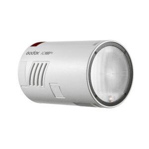 1669804233_717 Sylinterinmuotoinen harmaa Godox AD100 Pro TTL-stroboskooppivalaisin, jossa on kuvioitu sivu, tuuletusaukot ja suuri pyöreä salamalinssi eteenpäin.