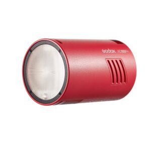 1669807643_660 Godox AD100 Pro TTL - Red, sylinterinmuotoinen kannettava salamalaite, näkyy valkoisella pohjalla, ja sen objektiivi ja sivusaukot ovat näkyvissä.