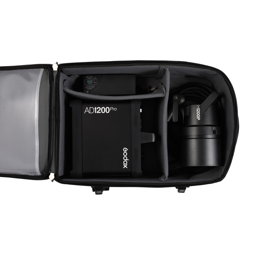 1704787715_215 The Godox CB-17 Carry Roller Bag AD1200 Pro holds your studio studio studio amp, power supply and coiled cable safely in padded compartments for secure transport.