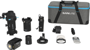 The NANLITE Forza 60B II LED Bi-color with 19° and 36° projection mount is on display, featuring lens and projector parts, mounting accessories, cables, power supply, remote control and a grey case with blue accents and black handles.