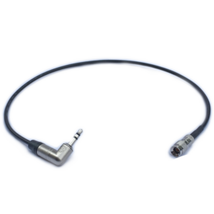 800q-01_121982 The ATOMOS cable feeds MIC-level time code from the LTC port of the UltraSync ONE and features a black design with a rectangular 3.5mm audio jack and a metal coaxial connector, shown against a white background.