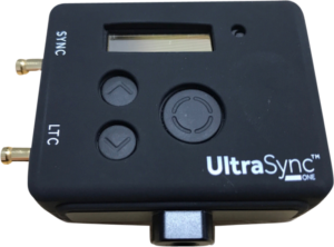 800q-01_121985 Black ATOMOS silicone case designed to fit the UltraSync ONE with openings on the left side for the display, buttons and SYNC/LTC ports. The UltraSync ONE logo remains visible in the bottom right corner when installed.