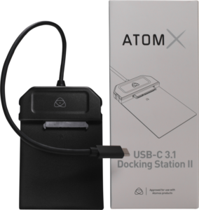 800q-01_121993 The black ATOMOS AtomX USB-C 3.1 Powered Docking Station with cable is shown next to the packaging with the brand name and picture.