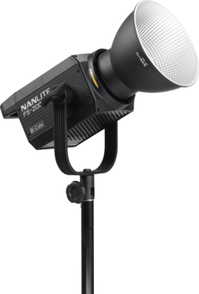 800q-01_122029 NANLITE FS-200B Two-colour LED spotlight mounted on a black stand, facing upwards, with a large silver reflector and ventilated housing.