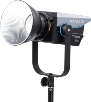 800q-01_124983 The NANLITE FC-300B LED Bi-color Spot Light is mounted on a black base with a large reflector plate and blue accent, shown against a plain light background.