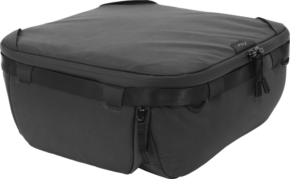 800q-01_125232 The Peak Design Camera Cube V2 (Medium) is a black, rectangular, soft-shell bag with zipper and side handles, designed for travel or camera gear, pictured against a plain background.