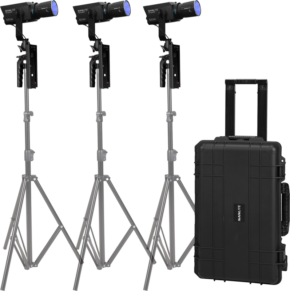 800q-01_126613 Three NANLITE Forza 60C RGBLAC LED 3 Light Kit studio lights with tall stands are placed side by side next to a large black, handled transport case, all against a white background.