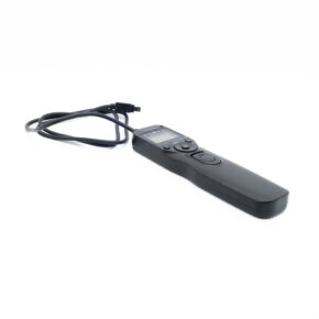 vello Vello Shutterboss II Timer Remote Switch for Nikon - Käytetty, musta, jossa on näyttö, painikkeet ja liitetty kaapeli, näkyy valkoisella pohjalla.