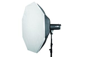 The Godox Octa Softbox 95cm is a large octagonal light diffuser mounted on a studio strobe and mounted on a black stand, ideal for professional photography.