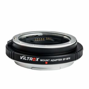 1547044580_818 The Viltrox EF - GFX II Autofocus Adapter, seen from an angle showing its electronic contacts and the "Viltrox EF - GFX II Autofocus Adapter" label on the black ring.