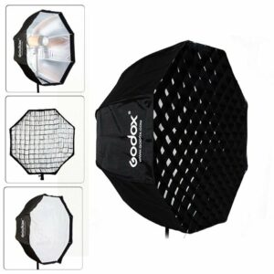 1551948708_684 The Godox SB-GUBW120 Softbox Octa with Umbrella 120cm + Grid is shown in black, and the smaller images on the left highlight its interior, the included grid and the front diffuser cover from different angles.