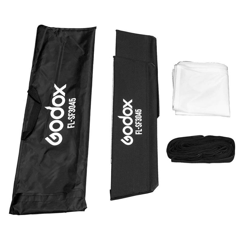 1575280211_345 Godox Softbox + Grid for FL60 -pakkaus sisältää mustan kantolaukun, kaksi suorakulmaista paneelia, taitetun valkoisen diffuusorin ja mustan hihnan, kaikki valkoisella pohjalla.