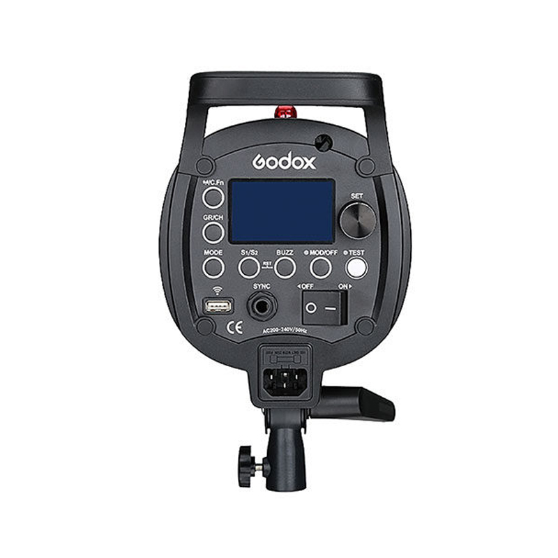 1603104754_401 Godox QT400II M -studiostroboskooppivalaisimen takanäkymä, jossa näkyy ohjauspaneeli painikkeineen, sininen LCD-näyttö, säätönuppi, virtakytkin, syöttöliitännät ja kiinnike valkoista taustaa vasten.