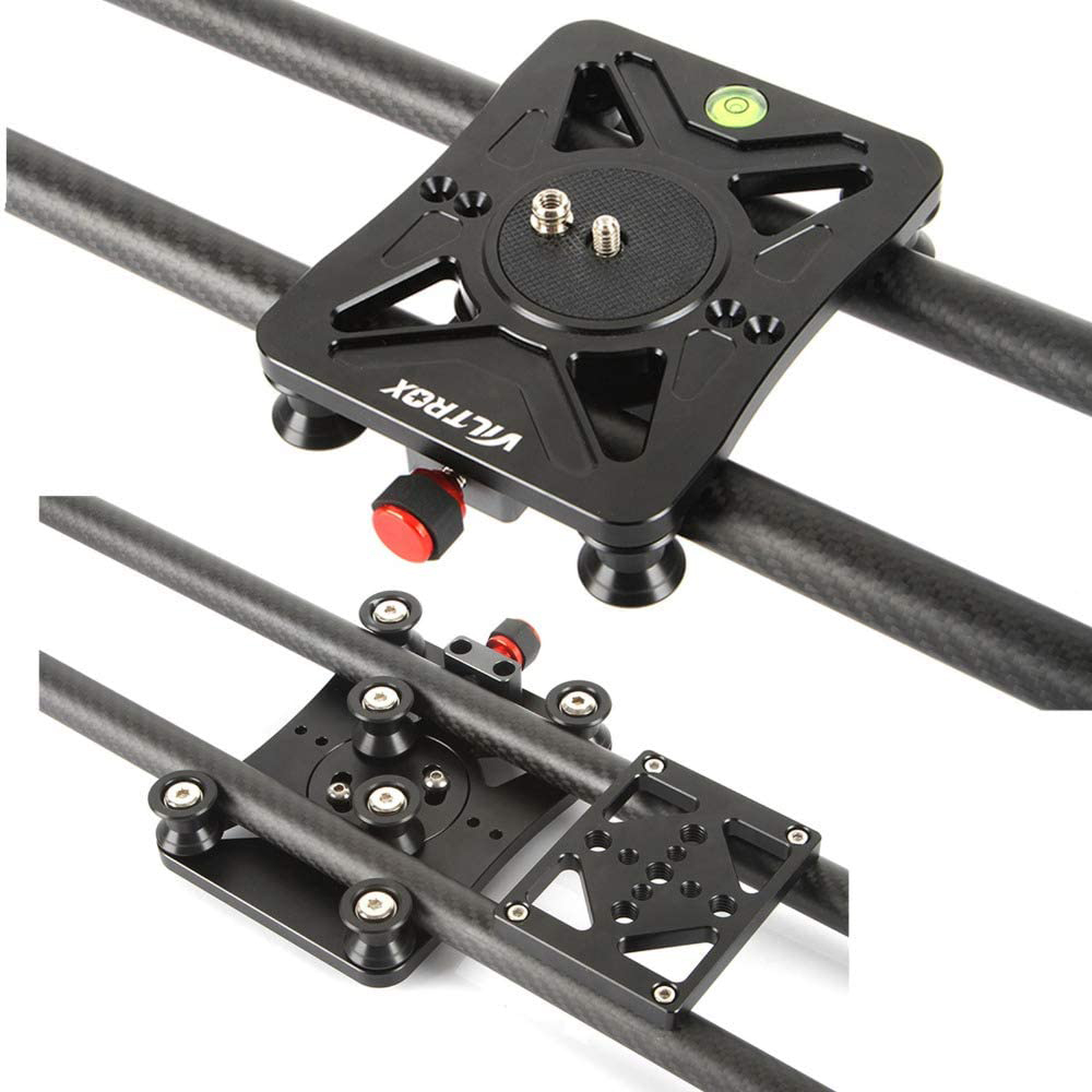 1617104958_692 Lähikuva mustasta Viltrox 80cm Carbon Fiber Track Dolly Rail Sliderista, jossa on kiinnityslevy ja vesivaaka sulavaa liikettä varten kaksoiskiskiskoilla, kahdesta kulmasta valkoista taustaa vasten.