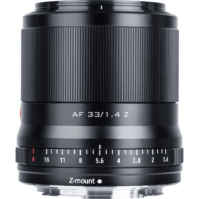 1636123968_544 Close-up of Viltrox AF 33mm f/1.4 lens, Nikon Z with black body, Z-mount, aperture ring with f/1.4-16 stops, and textured focus ring with detailed handwork.