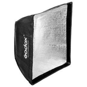 1637145249_865 Godox Softbox Fabric 60x60cm is a black, rectangular softbox with a textured silver inner surface, designed to diffuse light for photography and videography. The open design reveals its reflective inner lining.