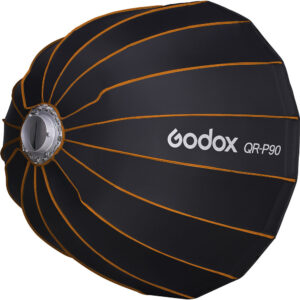 1646908705_902 Musta Godox Quick Release Parabolic Softbox QR PF90 Profoto, jossa on oranssi reunus, näkyy sivulta, jolloin sen pyöreä muoto ja vasemmalla oleva kiinnike korostuvat.
