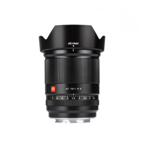 The Viltrox AF 13mm f/1.4 lens for the Sony E, shot vertically on a white background, has a black design with hood, focus and aperture rings and white and orange labels.