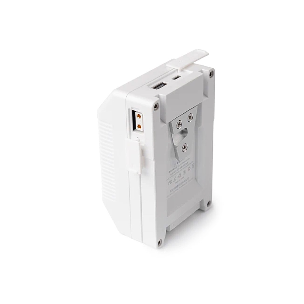 1681829736_902 Viltrox BP V99 6700mAh V-Mount -akku on valkoinen, suorakulmainen elektroninen laite, jossa on useita portteja ja metallinen sivukiinnike, joka näkyy valkoisella taustalla.