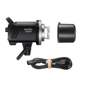 1682497680_610 Godox MS200V -studiostroboskooppivalaisin, jossa on irrotettava heijastin ja virtajohto alla, kaikki valkoisella pohjalla.