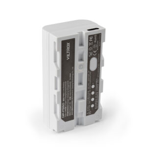 1692945331_130 The white Viltrox NP-F550 USB-C rechargeable battery pack stands upright, with a label with specifications, certification icons and a USB-C charging port at the top.