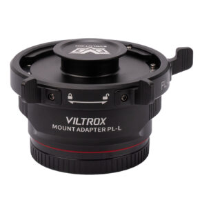 The black Viltrox PL-L adapter allows you to mount PL-mount lenses on L-mount cameras and features locking levers, a textured ring and a front label.