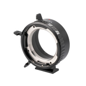 1709813662_486 The Viltrox PL-GFX is a black metal camera lens mount adapter with a circular opening and locking levers, designed for mounting various lenses on the camera body.