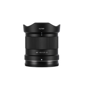 1713352327_527 A Viltrox AF 40mm f/2.5 lens, Nikon Z stands upright against a white background, showing a black cylindrical body and grooved focus ring.
