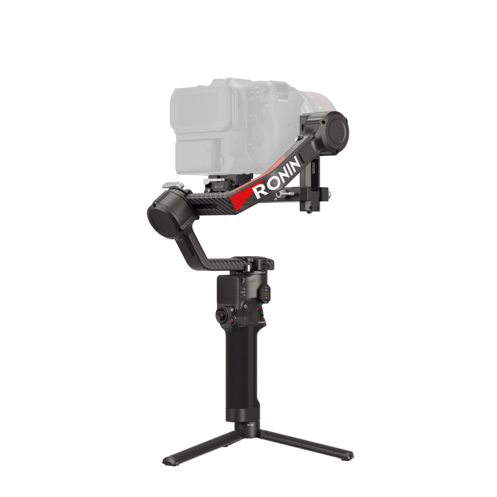 HG704-后侧45度 The DJI RS 4 gimbal is a black handheld gimbal with a white "RONIN" with a red stripe down the stem, pictured mounted with a semi-transparent camera and standing on a folding stand.