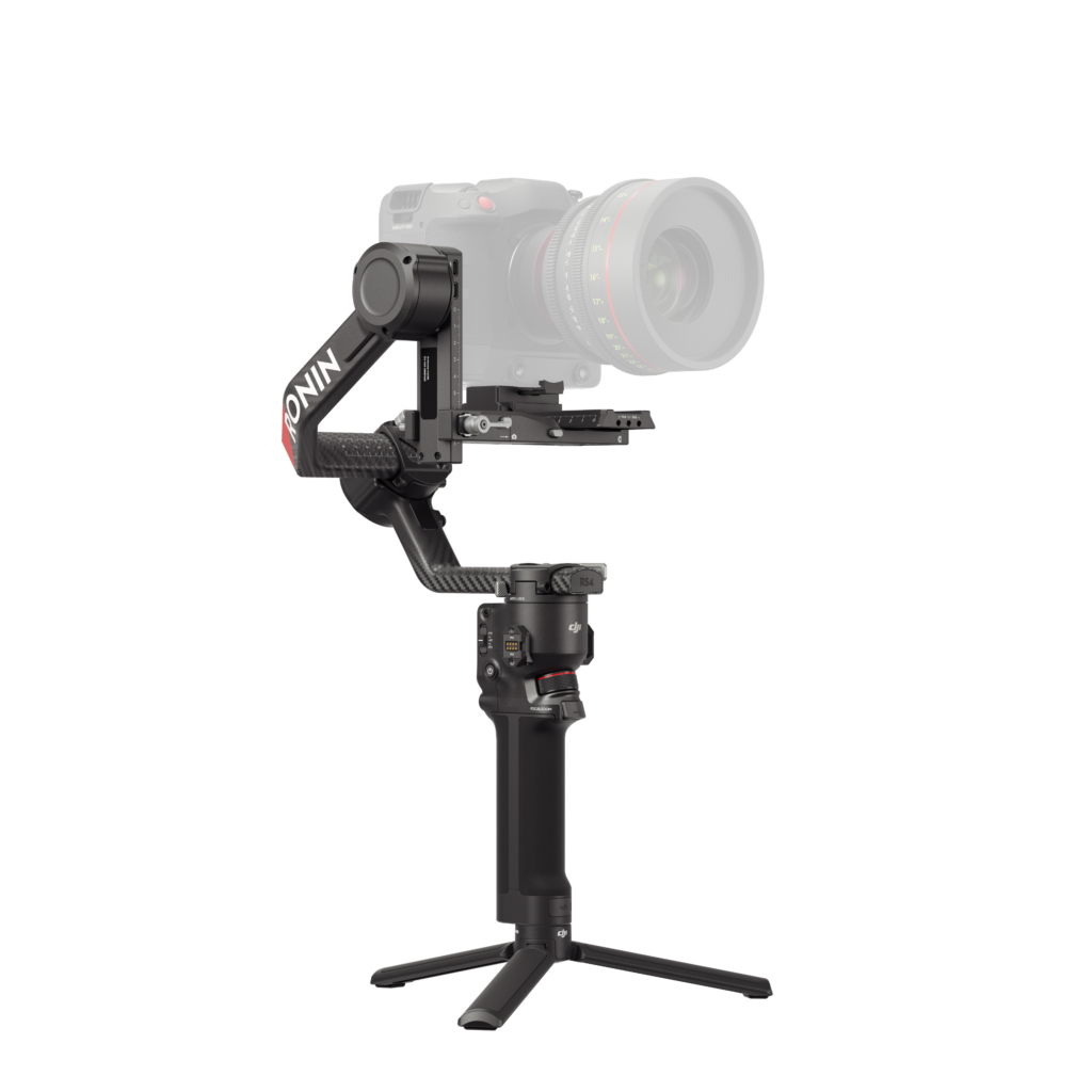 HG704-左45度 The DJI RS 4 gimbal handheld camera stabilizer, with a tripod and visible "Ronin" branding on its arm, is displayed with a mounted professional camera against a white background.