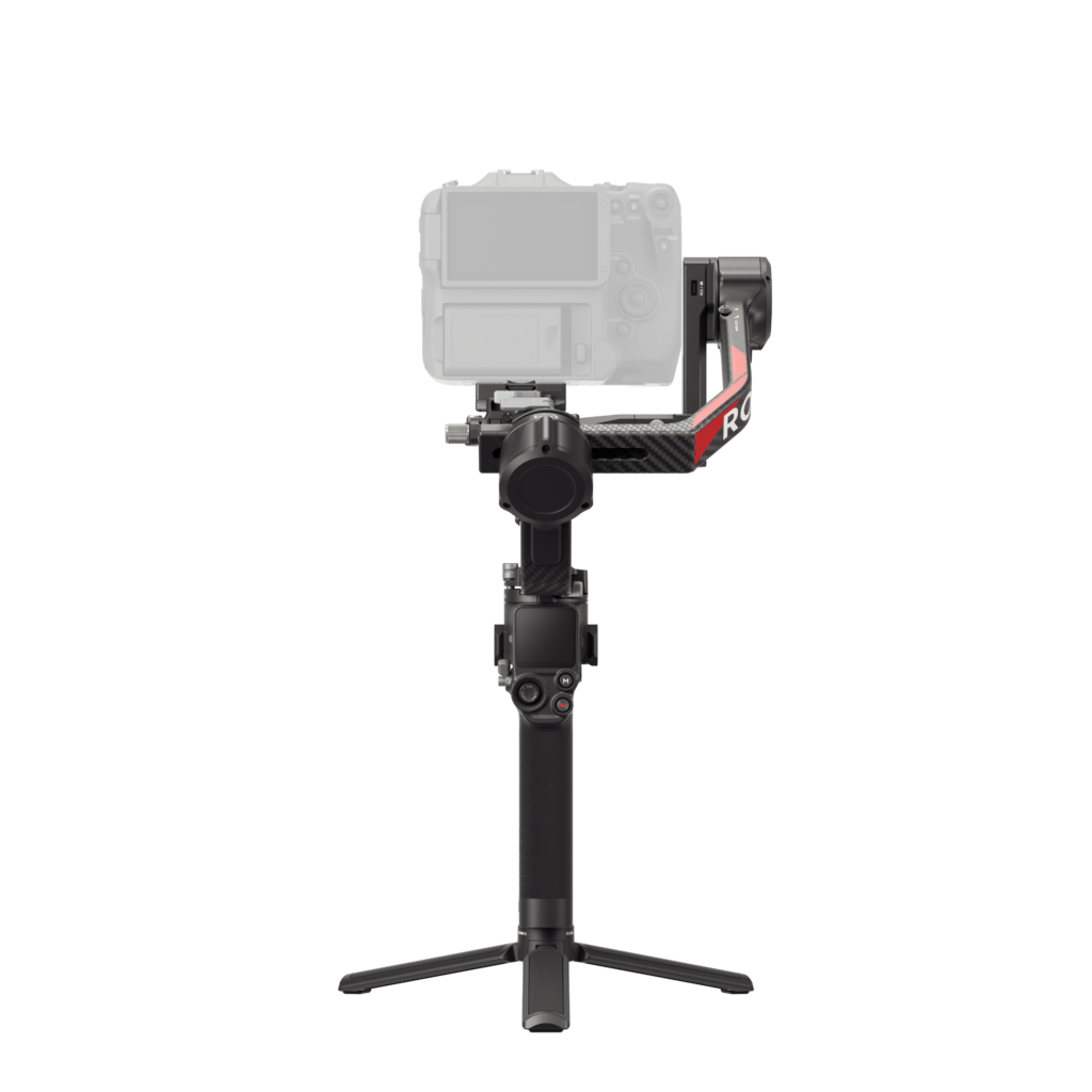 HG704-背面 The DJI RS 4 gimbal, featuring a black handheld gimbal stabilizer with stand, red accent and control buttons on the handle, supports the mounted camera against a white background.