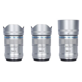 Sirui Sniper Kit S Three Sirui Sniper 23mm, 33mm & 56mm f/1.2 AF Z-mount lenses (silver), each fitted with a lens hood, are standing upright side by side against a white background.