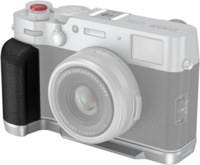 SmallRig_4555_002 The SmallRig 4555 L-shaped grip for Fujifilm X100VI/X100V (silver) is pictured attached to a silver Fujifilm camera with textured black grip, visible lens, top dials and built-in viewfinder, on a light background.