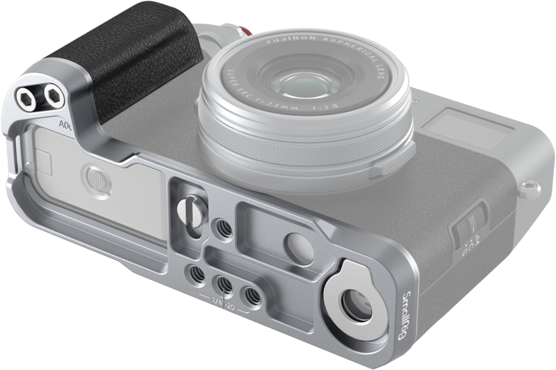 SmallRig_4555_003 The SmallRig 4555 L-shaped grip for Fujifilm X100VI/X100V (silver) features a textured grip and a metal base plate with multiple mounting holes, as seen from a low angle in the silver and black camera.