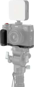 SmallRig_4556_005 With the Fujifilm X100VI and SmallRig 4556B L-shaped grip (black) attached to the end of the tripod, the camera and accessories are in sharp focus, while the base of the tripod appears slightly faded - ideal for photographic or video shooting setups.