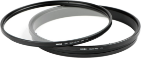 800q-01_107904 The NiSi filter UHD UC UV L395 CT-2 for the Canon EF 600mm f/4 lens with a stylish black metal body is shown overlapping the adapter ring on a white background.