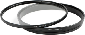800q-01_107906 Two round camera lens filters, including the NiSi Filter UHD UC UV L395 CT-4 for Canon EF 200mm, 300mm, 400mm & 200-400mm, are stacked on a white surface with one filter slightly overlapping the other.
